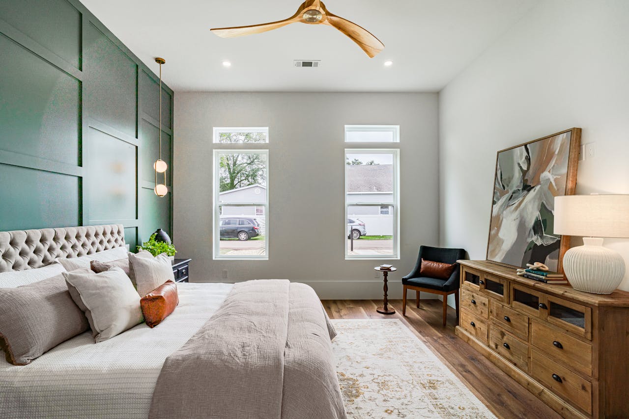 Luxurious modern bedroom interior with stylish decor and natural light in New Orleans.